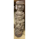 A South East Asian carved column, 90cm high