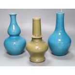 Two Chinese turquoise glazed vases and a celadon glazed bottle vase, height 20cm