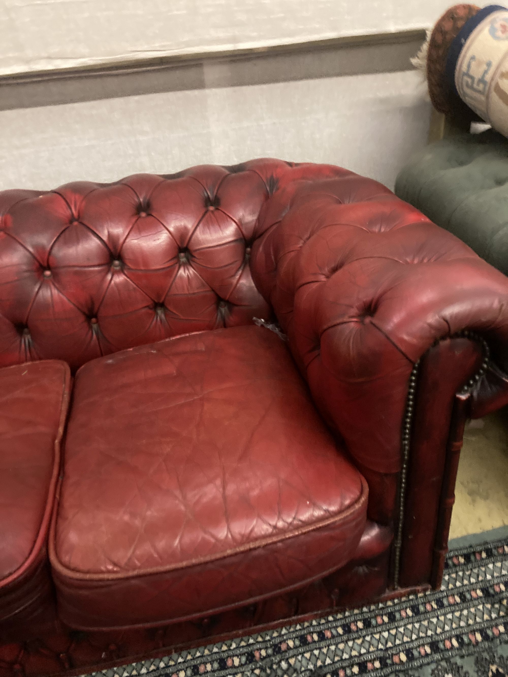 A Victorian style buttoned red leather Chesterfield settee, width 186cm depth 84cm height 66cm - Image 3 of 4