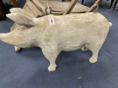 A carved wood butcher's shop model of a pig, length 76cm