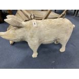 A carved wood butcher's shop model of a pig, length 76cm