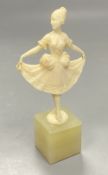 An Art Deco ivory figure of a dancer on an onyx base, height 12cm