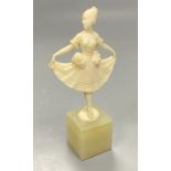 An Art Deco ivory figure of a dancer on an onyx base, height 12cm