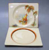 Two Clarice Cliff Biarritz shaped side plates, 19.5 x 23cmCONDITION: Both plates have scratches to