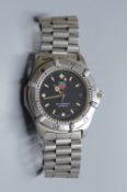 A gentleman's modern stainless steel Tag Heuer Professional quartz wrist watch, on stainless steel