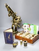 A Hawes of London large brass microscope and box of Victorian and late microscope slides