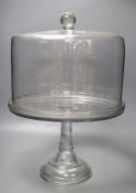 A Victorian glass pedestal cake stand and cover, height 53cm