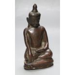 An 18th/19th century Burmese bronze figure of Buddha Shakyamuni, height 16cmCONDITION: