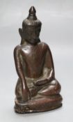 An 18th/19th century Burmese bronze figure of Buddha Shakyamuni, height 16cmCONDITION: