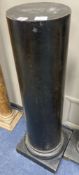 An ebonised wood column, height 99cm