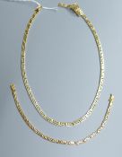 A modern 585 yellow metal Greek Key link necklace, approx. 42cm and matching bracelet, 18cm, gross