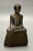 A 19th century Burmese silver overlaid wood figure of Buddha Shakyamuni, height 12cmCONDITION: