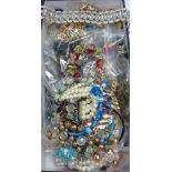 A large quantity of assorted costume jewellery.