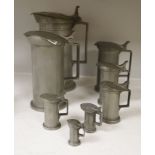 A set of eight graded French pewter measures