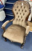 A Victorian walnut spoon back open elbow chair, width 70cm, depth 70cm, height 96cm