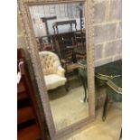 A reproduction rectangular parcel gilt wall mirror, width 70cm, height 168cm