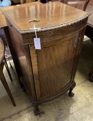 A 1920's Chippendale revival mahogany bowfront pier cabinet, width 50cm, depth 44cm, height 96cm