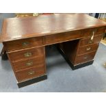 A 19th century and later military style mahogany military pedestal desk, width 140cm, depth 76cm,