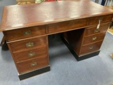 A 19th century and later military style mahogany military pedestal desk, width 140cm, depth 76cm,