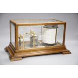 An early 20th century oak-cased barograph, length 36cm