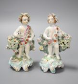 A pair of 18th century Derby figures of children holding baskets, height 12.5cmCONDITION: One basket