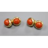 A pair of Cartier 750 yellow metal and coral bead set spherical cufflinks, signed and numbered