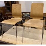 A set of four mid century design bentwood and chrome dining chairs