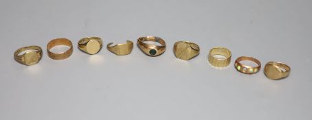 Nine assorted 9ct gold rings including three a.f., gross 31.9 grams.