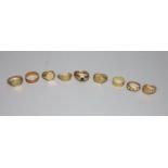 Nine assorted 9ct gold rings including three a.f., gross 31.9 grams.