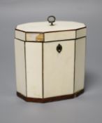 A George III octagonal ivory and tortoiseshell veneered tea caddy, height 10cm