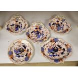 An English porcelain Imari part dessert serviceCONDITION: One dish - gilded handle glue reattached