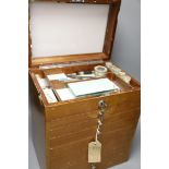 An early 20th century dentistry cabinet and tools