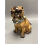 A German porcelain 'pug' tobacco jar and cover, late 19th century, height 18.5cmCONDITION: The