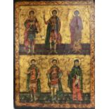 A late 19th century tempera on icon depicting six Saints, 47 x 35.5cm