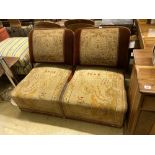 A Victorian carpet upholstered conversation seat with hinged adjustable back rests, length 134cm,