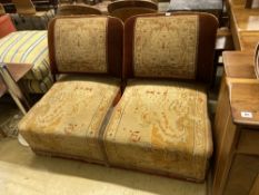 A Victorian carpet upholstered conversation seat with hinged adjustable back rests, length 134cm,