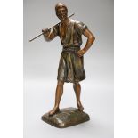 A spelter figure of a watercarrier, signed Debut, height 31cm