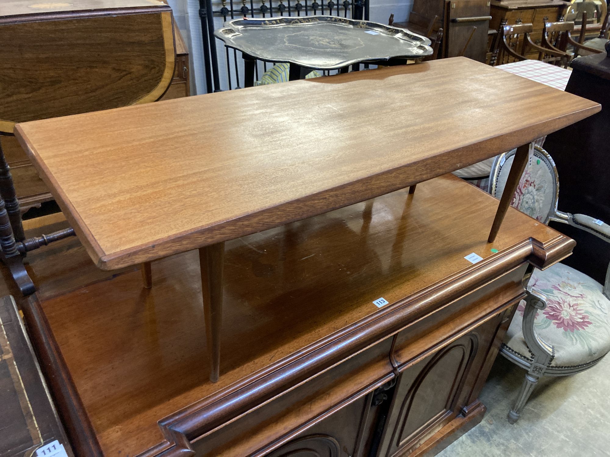A mid century design Gordon Russell coffee table, width 122cm, depth 44cm, height 39cm