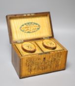 A George III harewood and marquetry tea caddy, c.1810, the fitted canisters labelled 'G' and 'B' for