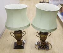 A pair of copper and brass table lamps, height 35cm