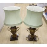 A pair of copper and brass table lamps, height 35cm