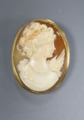 A modern cameo shell brooch-cum-pendant in 750 yellow metal mount with beaded edge, 41mm, gross 9.