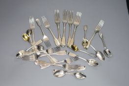 A harlequin set of George III and later silver initialled fiddle pattern flatware, comprising twenty