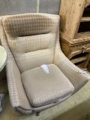 A Parker Knoll Statesman swivel and tilt egg chair, width 79cm, depth 84cm, height 94cm