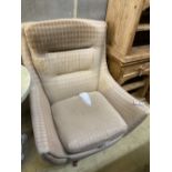 A Parker Knoll Statesman swivel and tilt egg chair, width 79cm, depth 84cm, height 94cm