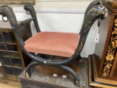 A Regency brass X frame dressing stool, from a design by Thomas Hope, width 88cm, depth 48cm, height