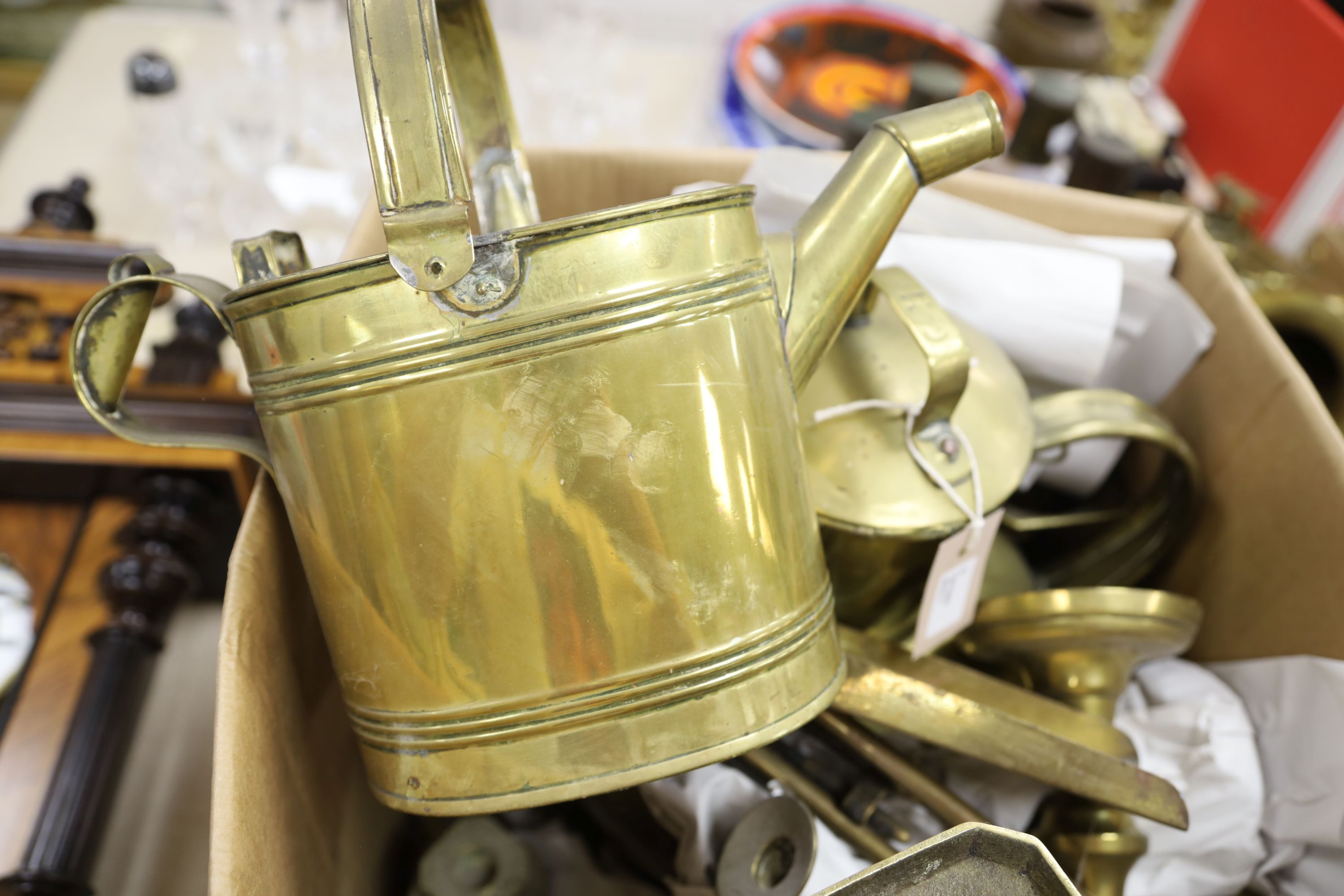 Collection of brass candlesticks, an Edwardian brass hot water jug, another brass jug and cover - Image 2 of 2