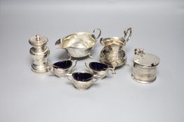 Assorted small silver, including a 1970's silver mustard, a modern silver pepper mill, three