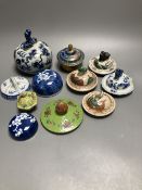 Eleven Chinese or Japanese porcelain or cloisonne enamel covers, tallest 11cm