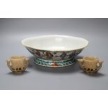 A Chinese dish, length 26cm and two soapstone potsCONDITION: The dish has a chip to rim. Soapstone